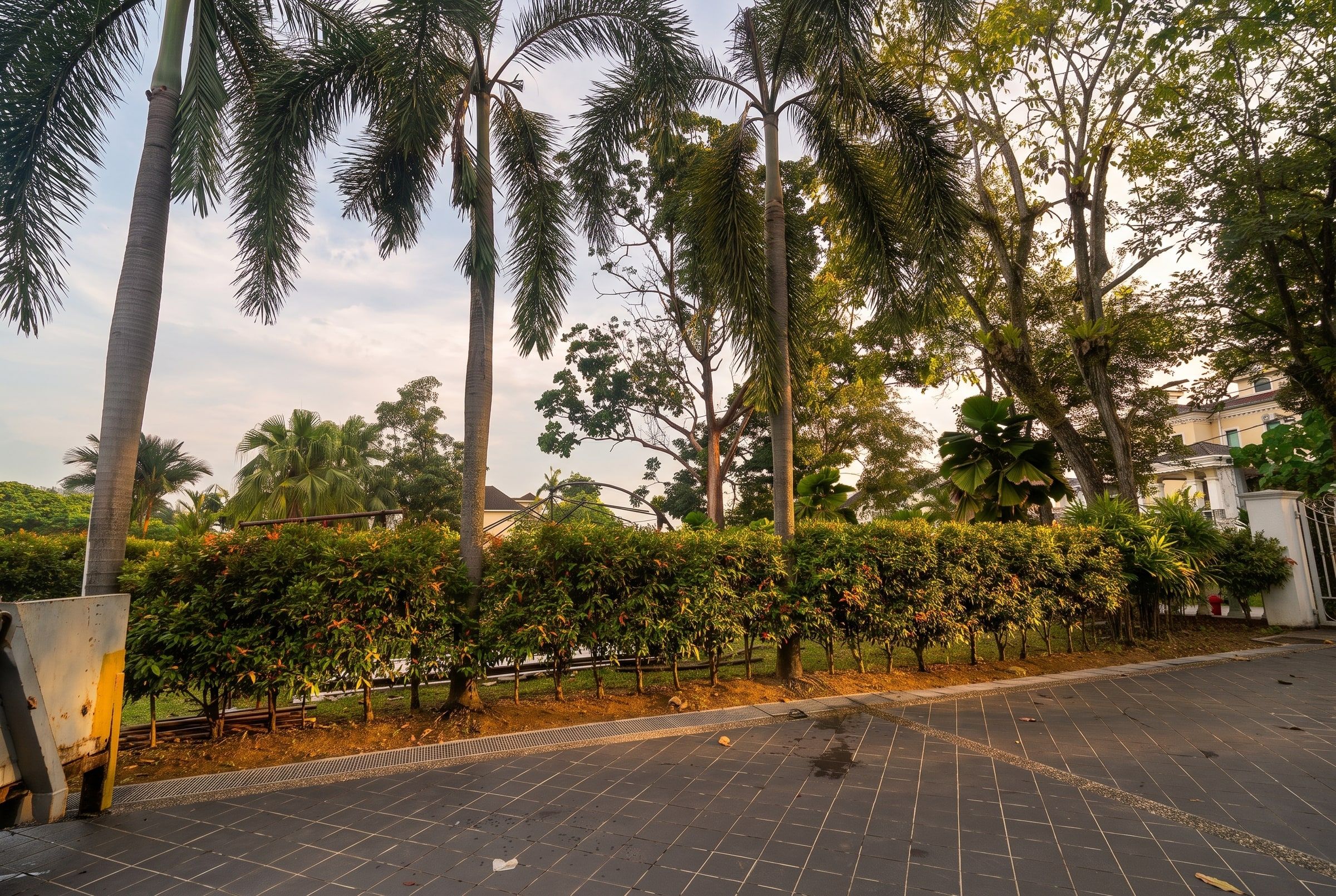 Lush greenery and hedges on the estate grounds