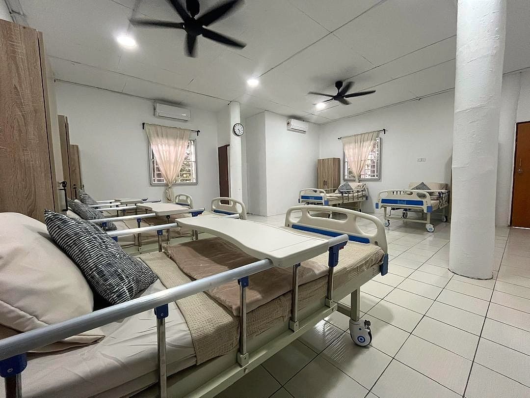 Care suite with adjustable medical beds ready for residents